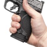 clip sleeve for M&P compact MP compact pistol in hand with 17 round magazine and sleeve