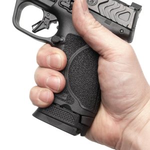 MP compact pistol in hand with 17 round magazine and sleeve