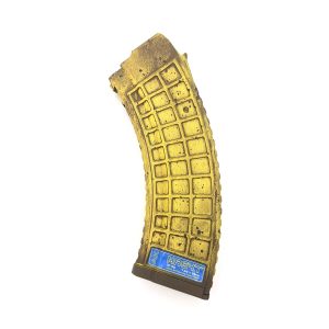 MAG47 Gen2 Rotten Banana Clip shown upright to left