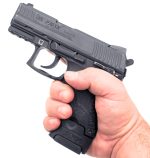 VP9sk extended clip in hand showing complete grip