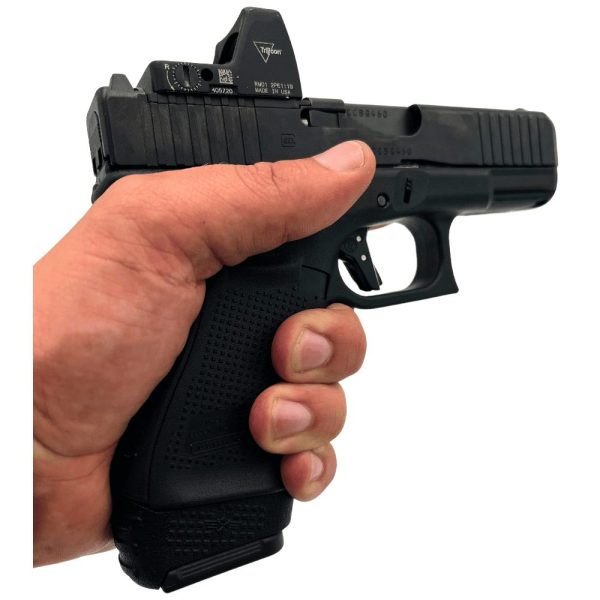 MAG19-17 in pistol in hand facing right showing improved grip