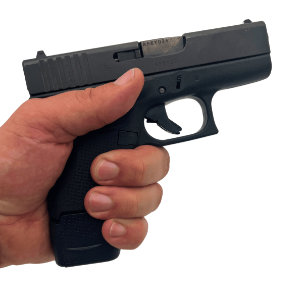 9 round Glock 9 round magazine in pistol facing right