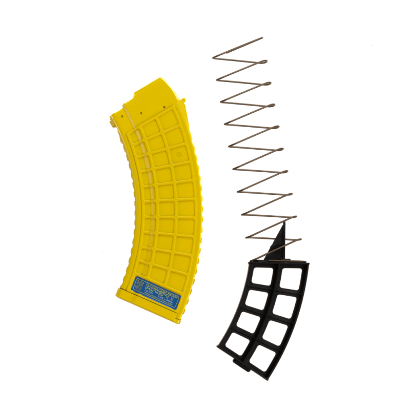 MAG47 1030 Gen2 banana upright with spacer XTech MAG47 10/30 Banana AK mag upright facing left with spacer showing to the right