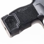 MTX 365 installed on P365 showing back half of pistol facing left. All parts are in black focusing on the texture and high quality finish of the MTX 365.