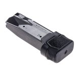 Sig Sauer P365 magazine with XTech Tactical MTX +3 installed into magazine facing rate and rotated slightly to the left. Showing base plate and spring button to disassemble for cleaning