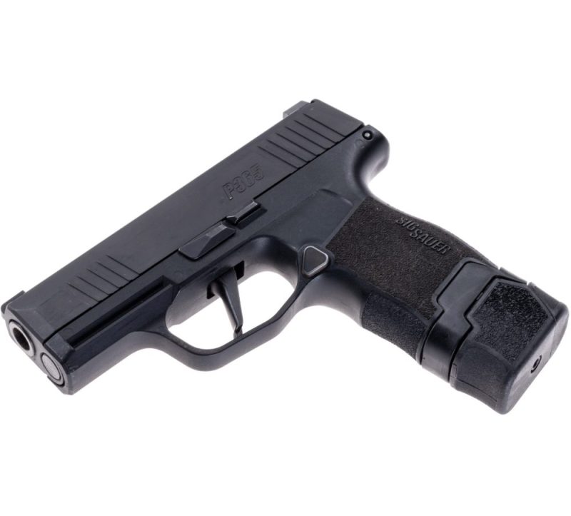 15rd Extended Magazine for P365 shown in P 365 pistol facing left and downward. All parts facing downward