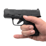 Hellcat California too short need extension Springfield hellcat pistol in hand facing left with factory magazine that does not support the pinky.
